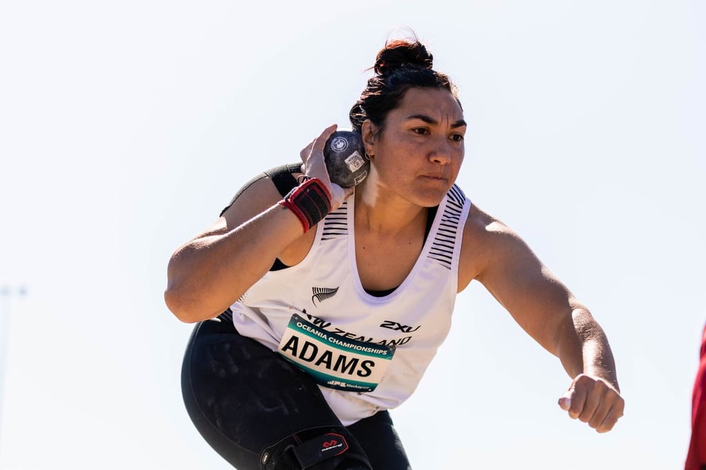 Lisa Adams wins Gold with a best of 14.45m in round two