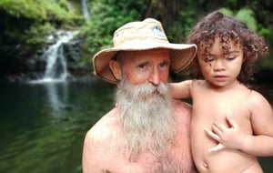 Tupaemanaia Dr Steve Brown carrying baby Lupe at the Malololelei Waterfall Lookout. Photo: Provided