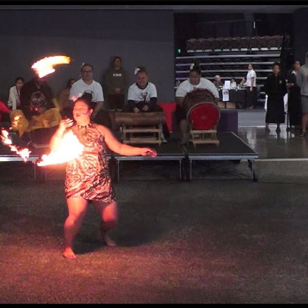 Wāhine Toa making a stamp in Siva Afi – Samoan fire knife dancing