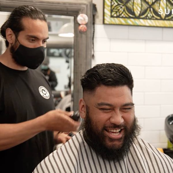 Auckland barbers and hairdressers re-open after three months