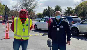 Tongan vaccination drive-in: Sione Feki (left) from Waitematā & Auckland DHBs and Tevita Funaki from The Fono. Photo: John Pulu, Tagata Pasifika