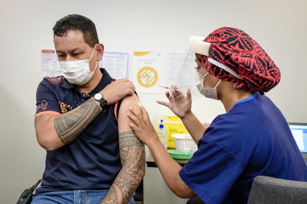 MIQ Worker Drew Leafa receiving the Covid-19 vaccine. Photo: Ministry of Health - Manatū Hauora