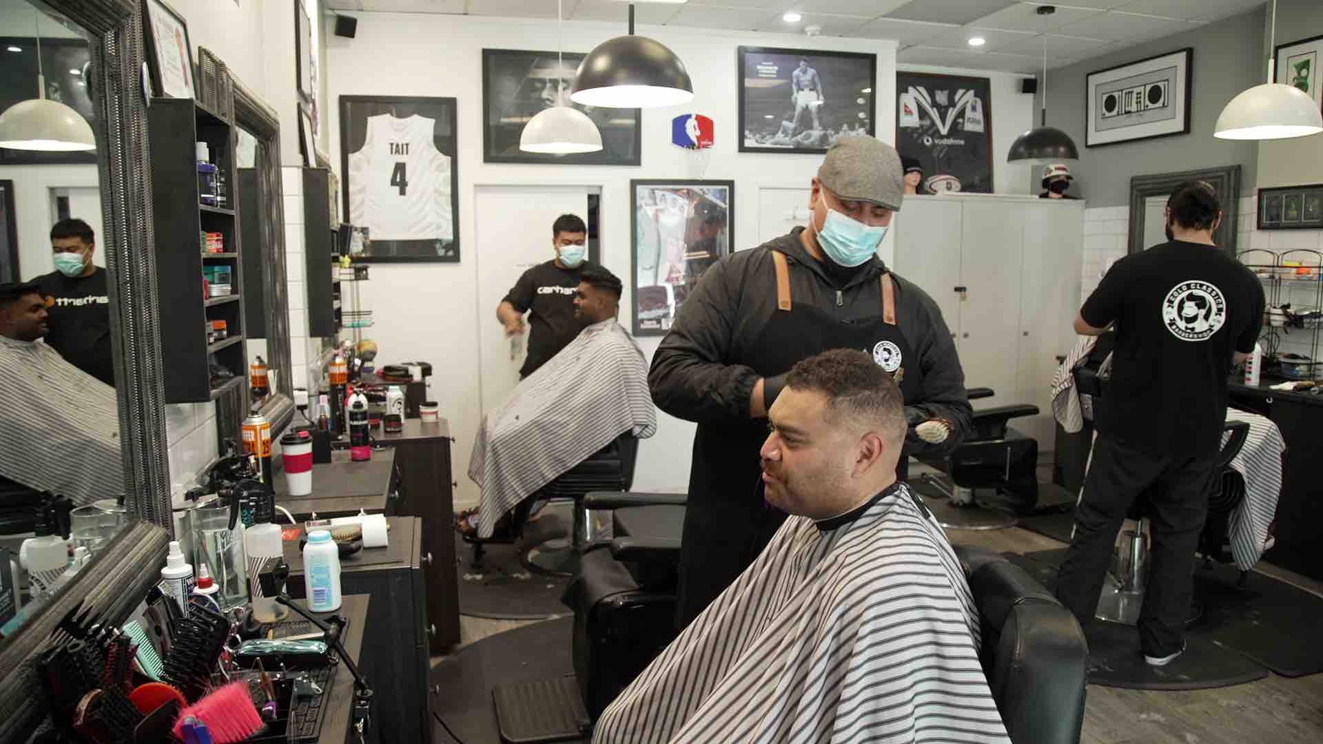 Auckland barbers and hairdressers reopen after three months